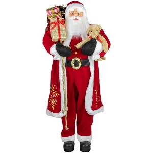 Northlight 5' Traditional Santa Claus with Teddy Bear and Gift Bag Standing Christmas Figure - 1 of 4