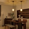 PAKOKULA 1-Light Matte Black Pendant Light with Open Metal Circle Cage and Clear Glass Shade - 4 of 4