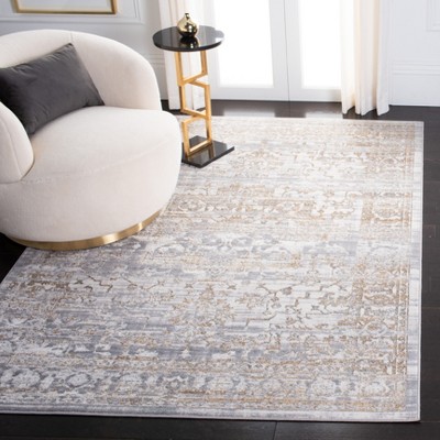 Abstract Gray and Gold 4'5" x 6'5" Synthetic Area Rug