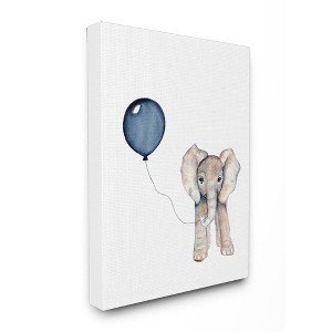 16"x1.5"x20" Baby Elephant with Blue Balloon Stretched Canvas Kids' Wall Art - Stupell Industries: Modern Pastel Decor - 1 of 3