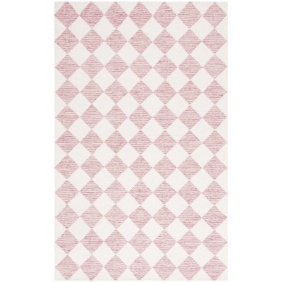 Ebony EBN120 Handmade Tufted Rug - Safavieh