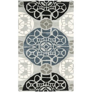 Wyndham WYD376 Hand Tufted Area Rug - Safavieh - 1 of 4