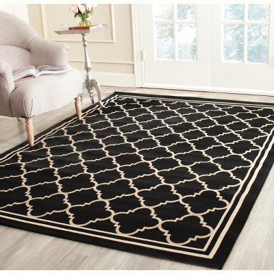 Black and Beige Geometric Outdoor Area Rug 6'7" x 9'6"