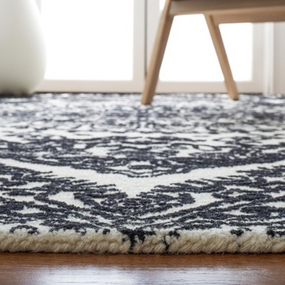 Ivory and Black Hand-Tufted Wool 8' x 10' Area Rug