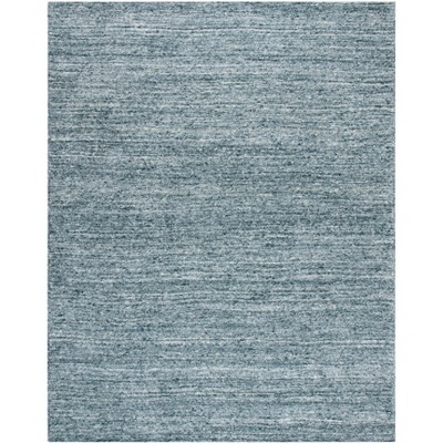 Handmade Himalaya Tufted Blue Wool Rectangular Rug - 5' x 8'