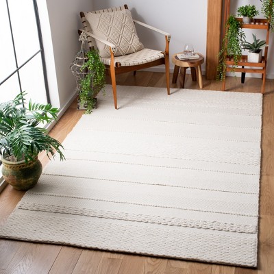 Ivory Elegance 4' x 6' Hand-Tufted Wool Rectangular Rug
