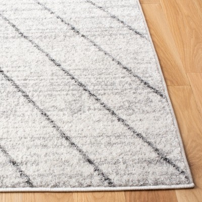 Rustic Lodge Red and Beige 6' x 9' Easy-Care Synthetic Area Rug