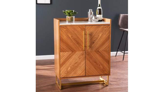 Bewdsin Bar Cabinet with Wine Storage Brown/White - Aiden Lane, 2 of 12, play video
