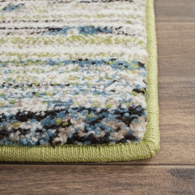 Porcello Black and Multi-Color Floral Synthetic Area Rug