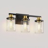DORESshop 17 in. 3-Light Black and Gold Vanity Light with Clear Cylinder Glass Shades and Square Backplate - 2 of 4