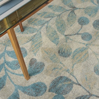 Ivory and Turquoise Floral Synthetic 6' x 9' Area Rug