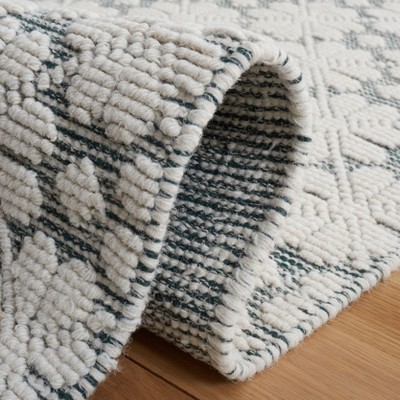 Handmade Ivory and Green Wool 9' x 12' Area Rug