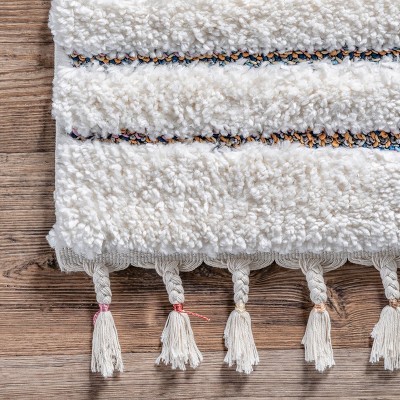 Ivory Geometric Synthetic Rectangular Area Rug with Braided Tassels