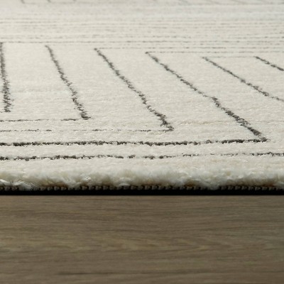 White Geometric Polyester and Polypropylene Area Rug