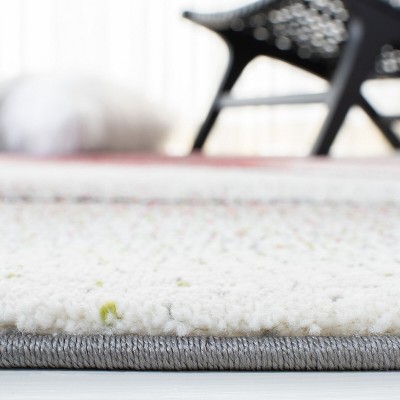 Handmade Grey and Red Round Synthetic Area Rug