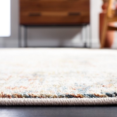 Rust and Blue Hand-Knotted Synthetic Area Rug