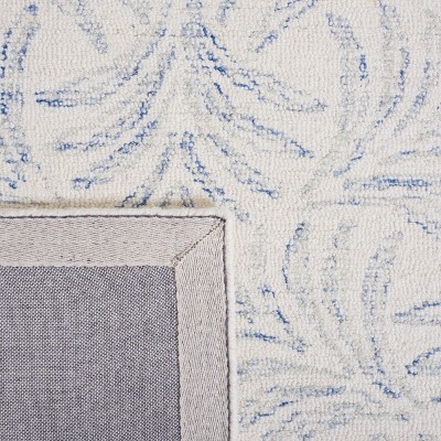 Ivory and Blue Floral Hand-Tufted Wool Area Rug