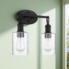 Sunset Lighting Clyde Vanity, Steel Round Glass Clear Seedy Matte Black Finish - 2 of 3