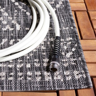 Black and Beige Rectangular Geometric Indoor/Outdoor Area Rug