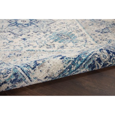 Ivory and Light Blue Synthetic 6' x 9' Easy Care Rug