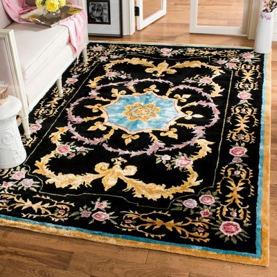 Lavish Purple Wool 6' x 9' Hand-Tufted Rectangular Area Rug