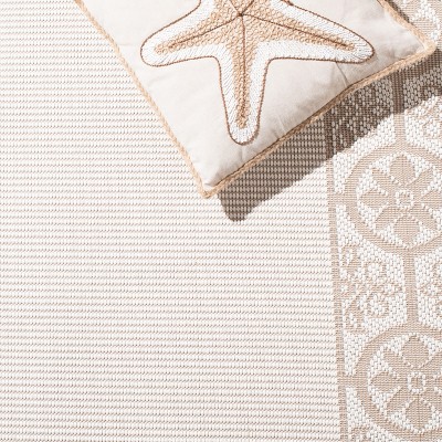 Ivory and Beige Geometric Synthetic Indoor/Outdoor Area Rug
