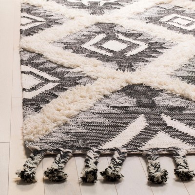 Kenya Hand-Knotted Black and Ivory Wool Rug