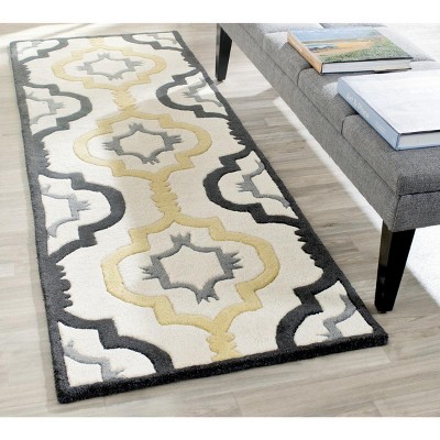 Off-White Handmade Wool Tufted Rug, 27" x 8"