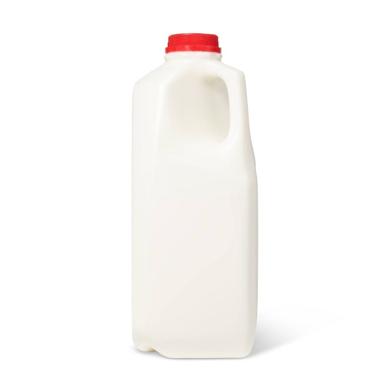 A white plastic milk jug with a red cap.
