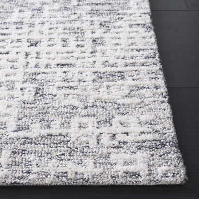 Ebony EBN216 Handmade Tufted Rug - Safavieh