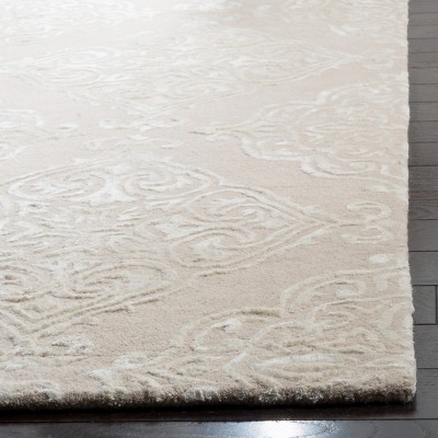 Beige and Ivory Rectangular Hand-Tufted Wool Area Rug