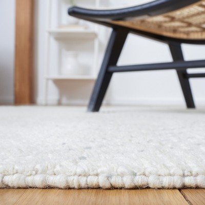 Ivory and Grey 8' x 10' Handmade Wool Shag Rug