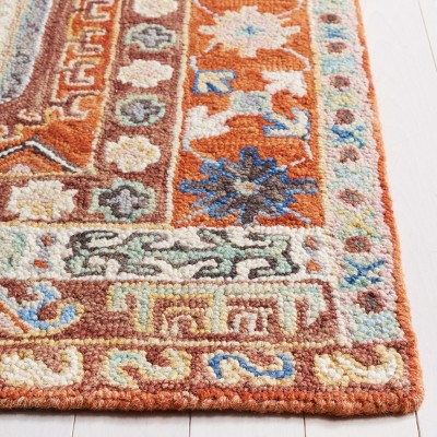 Ivory and Rust Handmade Wool Tufted Rectangular Area Rug 5' x 8'
