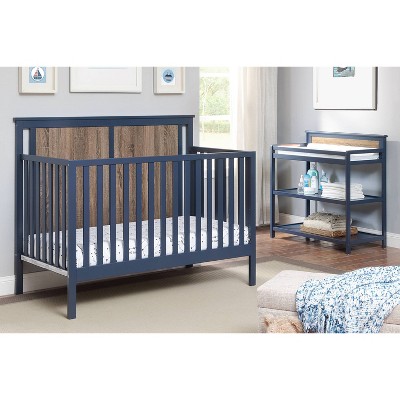 navy blue crib and dresser