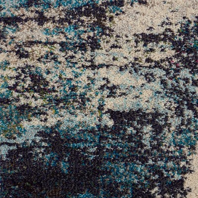 Ivory and Teal Blue Abstract 6' x 9' Synthetic Area Rug