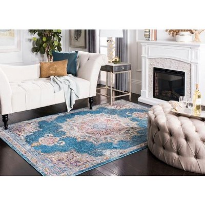 Navy and Ivory 4' x 6' Synthetic Oriental Area Rug
