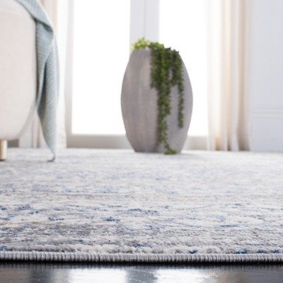 Ivory and Blue Reversible Flat Woven 8' x 10' Synthetic Rug