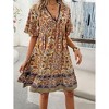 Coolmee Womens Dresses Boho Floral V Neck Short Sleeve Smocked Elastic Waist Casual A-Line Swing Mini Dress Sundress - 4 of 4