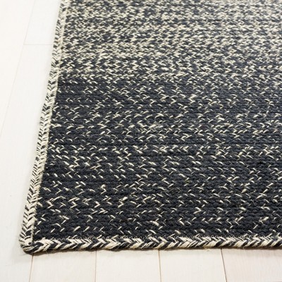 Handmade Natural and Black Jute Area Rug, 6' x 9'