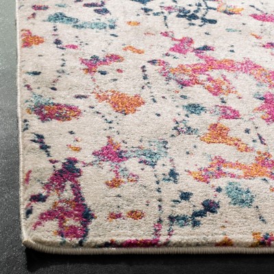 Ivory and Red Speckled Print Synthetic Area Rug