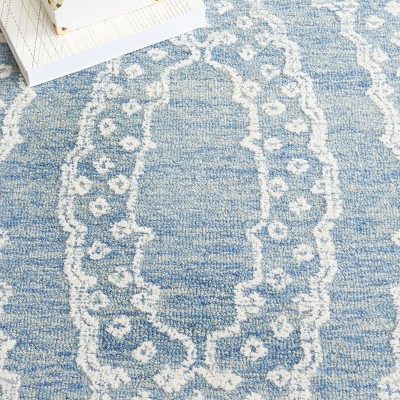 Ivory and Navy Tufted Handmade Wool Area Rug, 6' x 9'