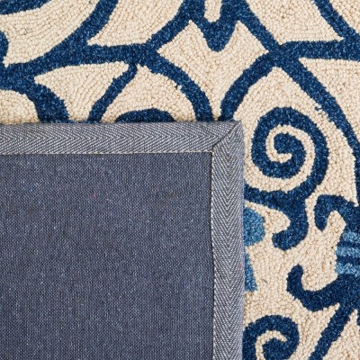 Ivory and Dark Blue Handmade Wool 6' x 9' Area Rug