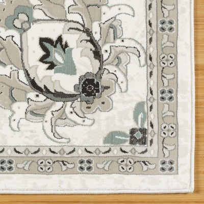 Ivory and Gray Tufted Synthetic 6' x 9' Area Rug