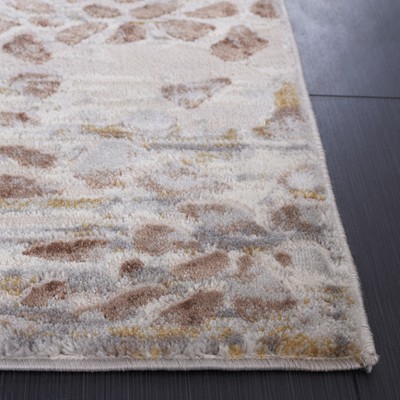 Ivory and Beige Hand-Knotted Synthetic Area Rug