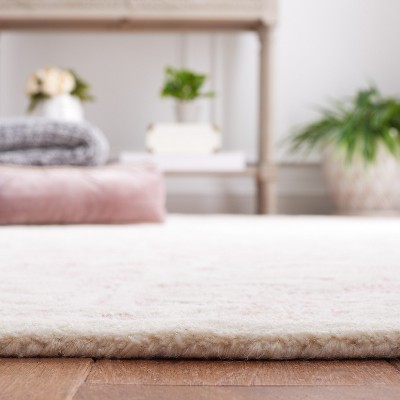 Handmade Pink and Ivory Tufted Wool 8' x 10' Area Rug