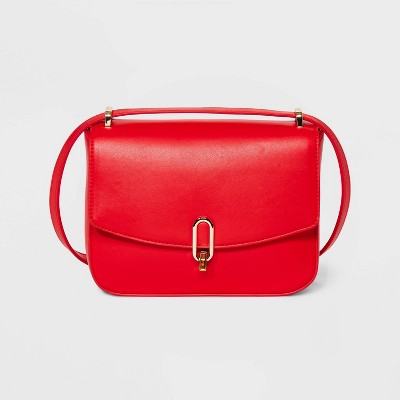 Purses with red online interior