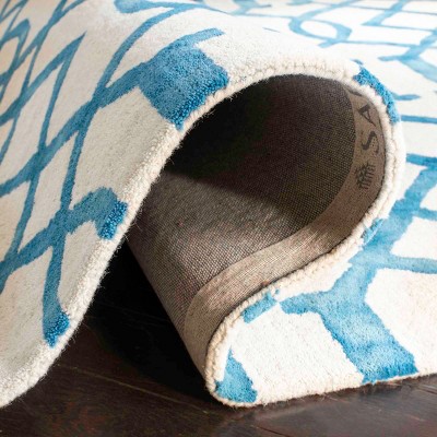 Ivory and Turquoise Hand-Tufted Wool 6' x 9' Area Rug