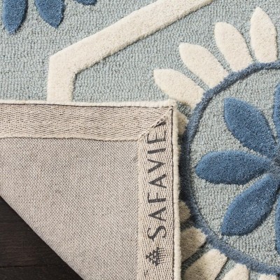 Hand-Tufted Elegance Blue & Ivory Wool Area Rug, 4' x 6'