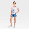 Girls' Short Sleeve Stitch Ringer T-Shirt - The Disney Collection by Cat & Jack™ White - 4 of 4