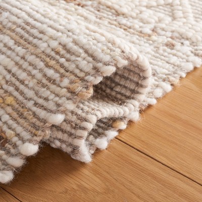 Ivory and Beige Handwoven Wool Area Rug with Tassels, 3' x 5'